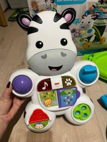 interaktywny chodzik Zebra firmy Fisher Price