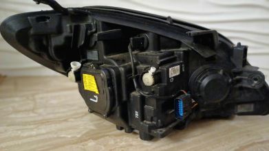 lampa OPEL MOKKA 12-15r Lewa Xenon