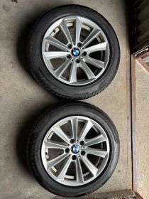 sprzedam koła od bmw z oponami zimowymi