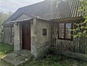 Działka 8,54 ara z drewnianym domem i budynkiem...