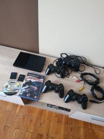 sprzedam PS2 + 2 pady bezprzewodowe + 2...